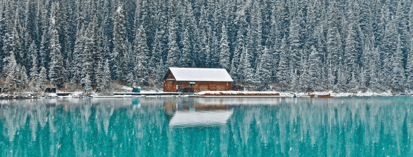 logcabin on a lake in canada