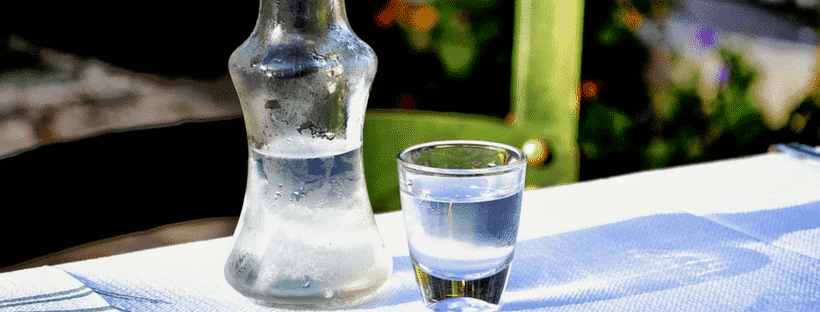 A shot glass of Ouzo in Mykonos, Greece