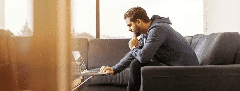 A man using his laptop with a VPN for internet security