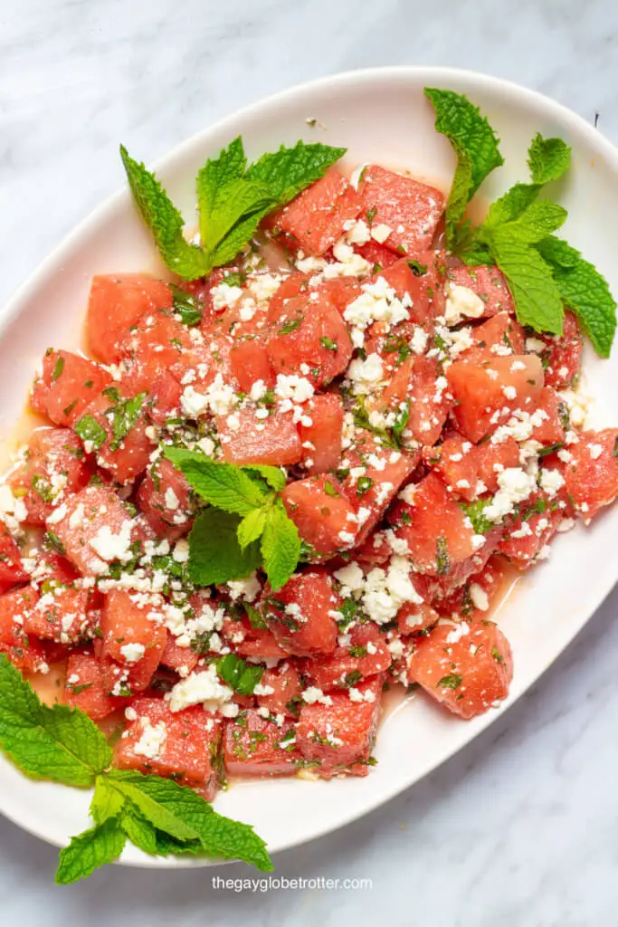 A serving platter of watermelon feta salad.