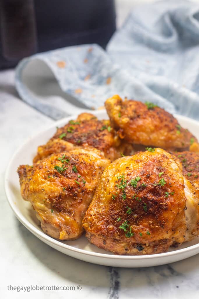 Air Fryer Chicken Thighs {So Crispy!} - The Gay Globetrotter