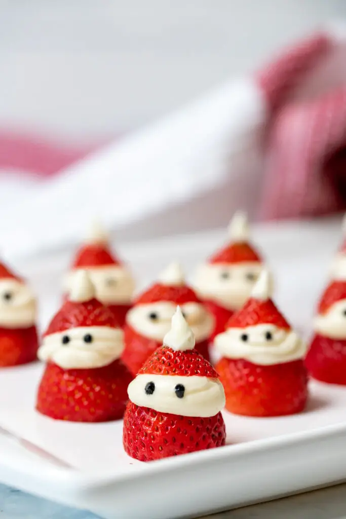 Strawberry santas on a serving platter.