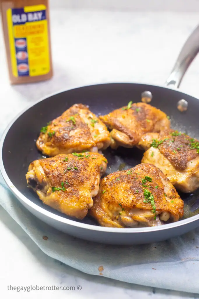 A pan of old bay chicken thighs ready to be served.