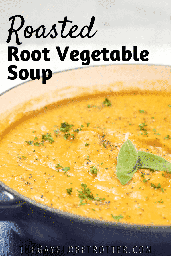 A pot of roasted root vegetable soup with text overlay.