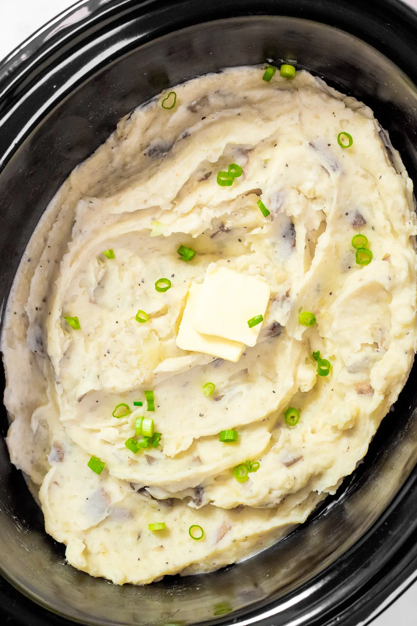 Mashed potatoes in a slow cooker.