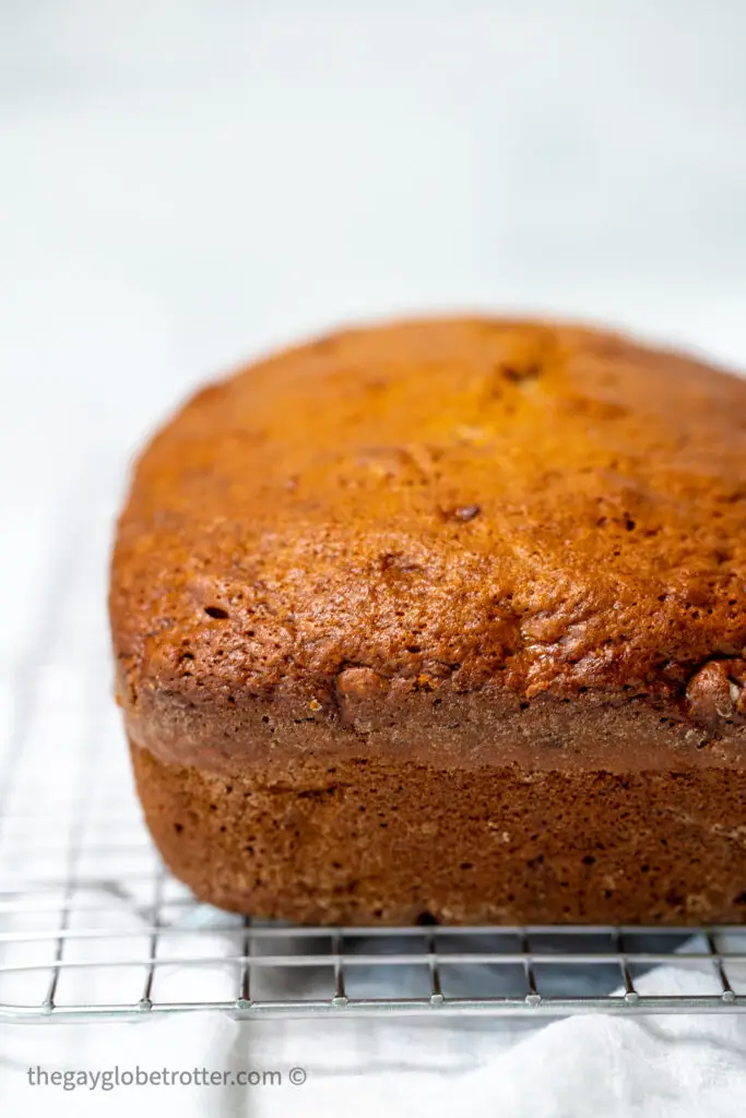 Banana bread on a cooling rack.