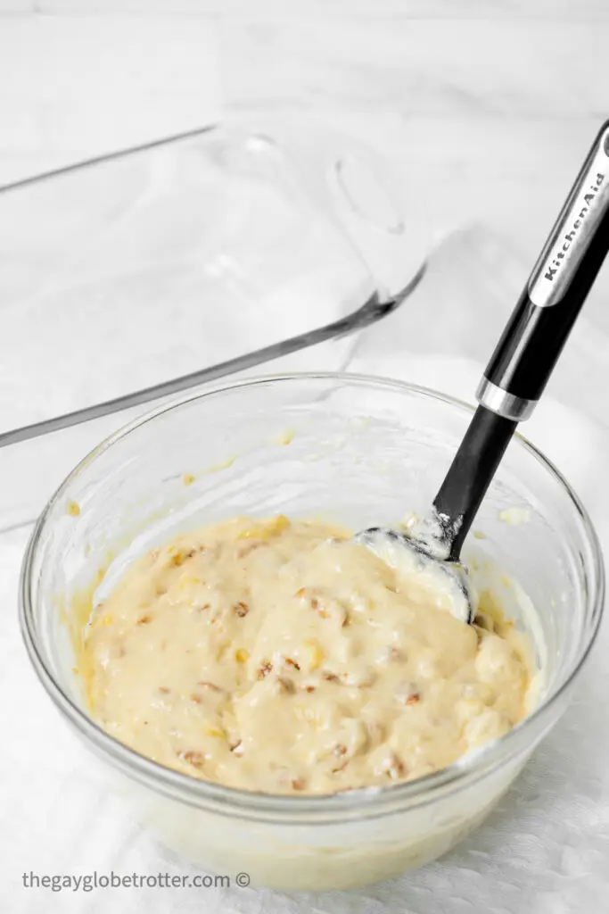 Banana bread batter being stirred.